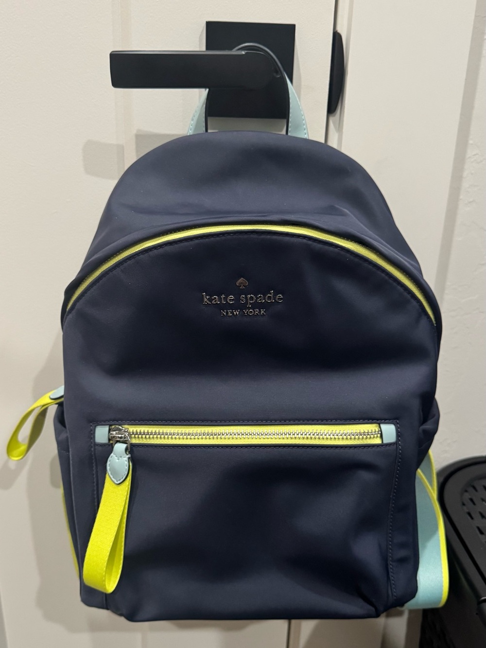 kate spade navy backpack with neon yellow and mint accents Chelsea Medium